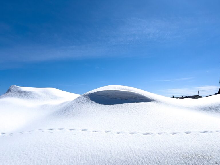 Footprints in the snow spreading into space